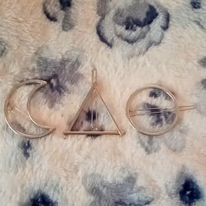 Three silver hair clips